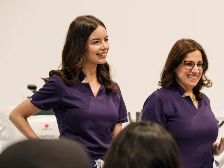 SharpLight team members in clinic uniforms